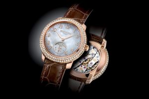 patek philippe ladies complications ref 4968R in rose gold diamond case mother of pearl dial and moonphase display