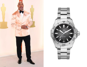 Johnson paired his pink suit jacket with a rugged Tag Heuer Aquaracer Professional 200. Photo composite: Instagram/Dwayne Johnson, Tag Heuer
