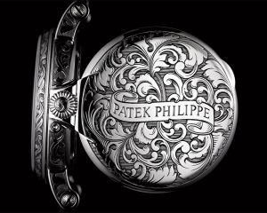 The Patek Philippe Ref. 5160/500G Perpetual Calendar with Retrograde Date has a hand-engraved, hinged caseback with a fleur-de-lis inspired motif.