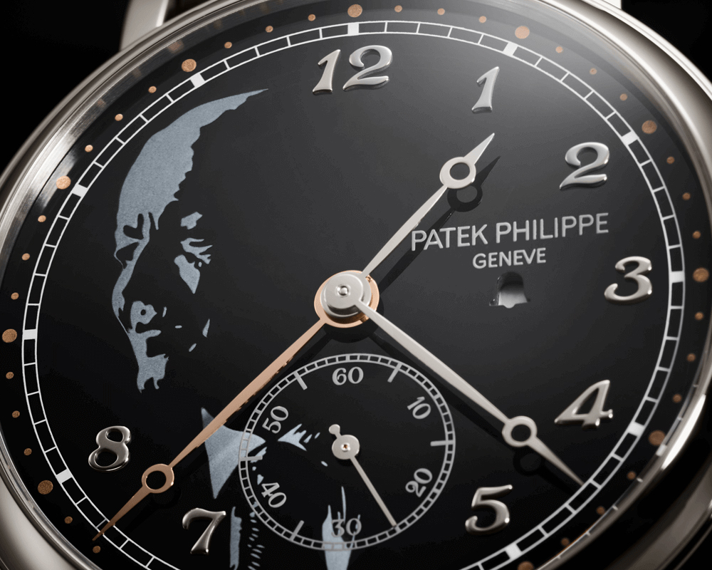 The Patek Philippe Ref. 1938P Minute Repeater Alarm combines artistry in the form of grisaille enamelling on the dial, with innovative watchmaking by combining the minute repeater and alarm functions in one. 