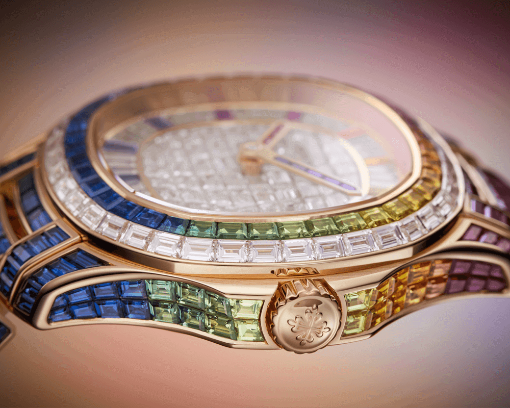 Patek Philippe Ref. 5260/1455R-001’s case is set in gemstones, ranging from multi-coloured sapphires to diamonds.