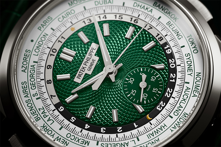 The Patek Philippe World Time Chronograph Ref. 5930P-001 in platinum case with hand-guillochéd dial in green with matching strap.