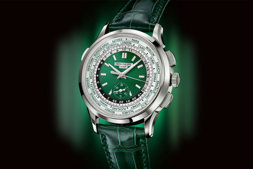 The Patek Philippe World Time Chronograph Ref 5930P 001 in platinum case with hand guillochéd dial in green at Cortina Watch