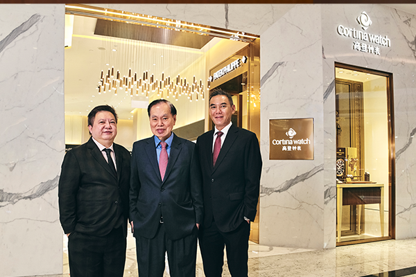 Anothy, Raymond and Jeremy Lim in front of Cortina Watch Boutique (4th)