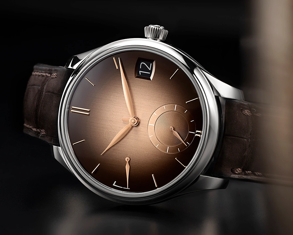 梅花萬杂墨 H. Moser & Cie. 亨利慕时勇创者系列万年历烟熏三文鱼色腕表：感受制表
